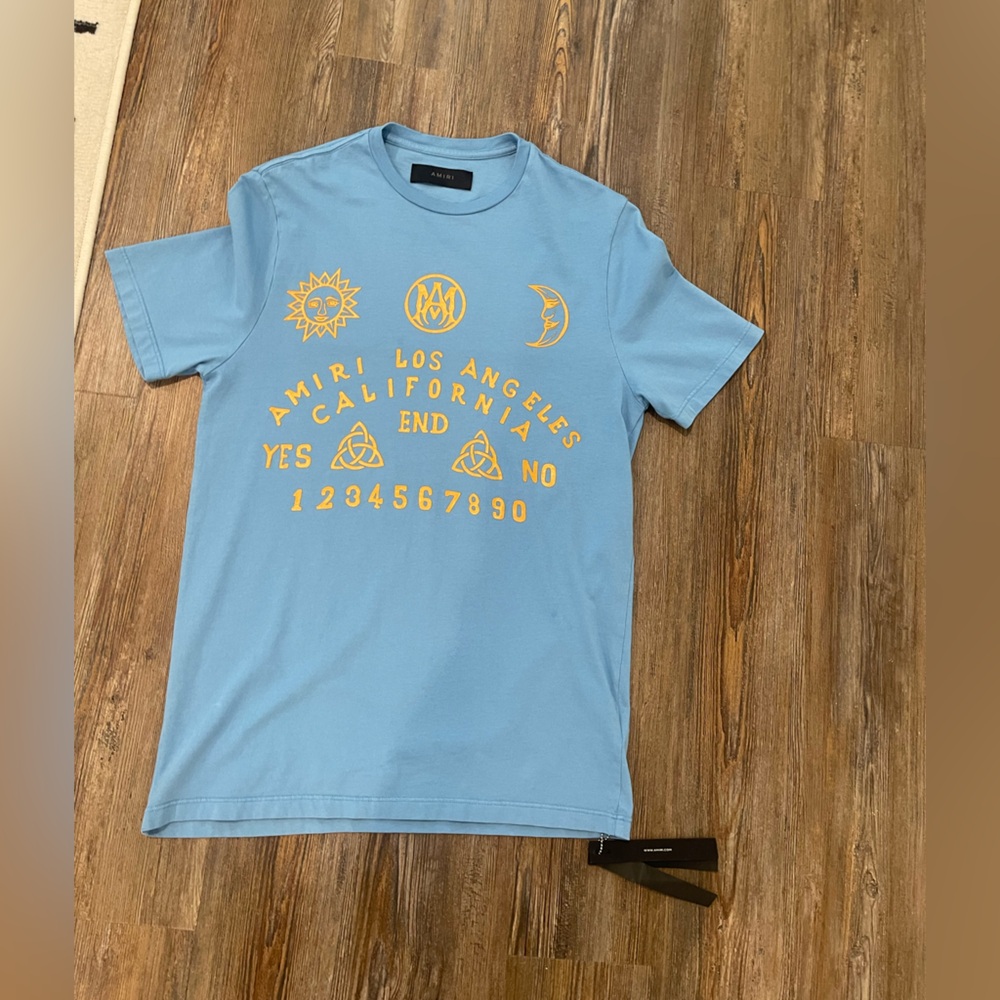 AMIRI Light Blue Men T-Shirt with Yellow Graphics